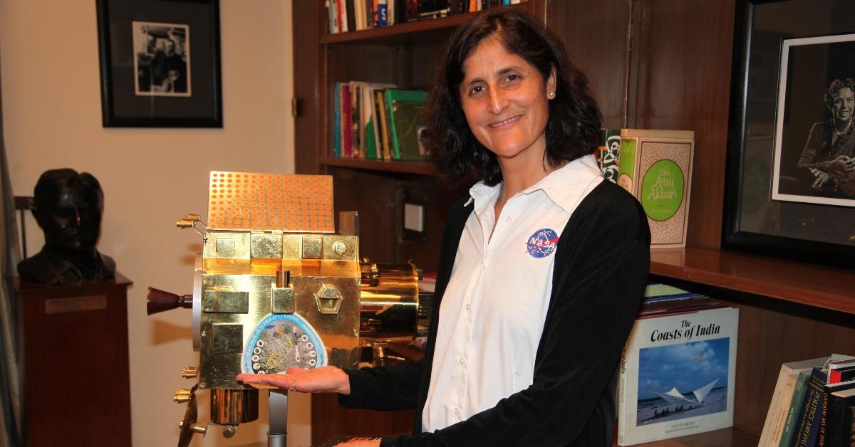 NEW DELHI, INDIA. Astronaut Sunita Williams a NASA explorer of Indian origin seen here with a scaled model of the Chandryaan 1 or the first Indian mission to the moon. Williams is slated to fly into space on the private rocket commissioned by NASA. . Indian women scientists and Engineers are playing an important role as they help the country fly its rockets, missiles and help fabricate satellites. One third of the work force at the Indian Space Research Organisation comprises of women and ladies are and reaching leadership positions. India's mission to Mars, Moon and the first Indian inter-continental ballistic missile all had women contributing in a big way, breaking the prevailing stereotype.. (Photo by Pallava Bagla/Corbis via Getty Images)