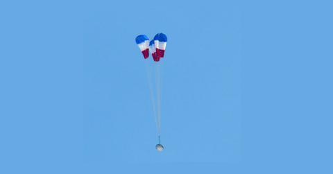 A parachute deployed during a Boeing orbital test.