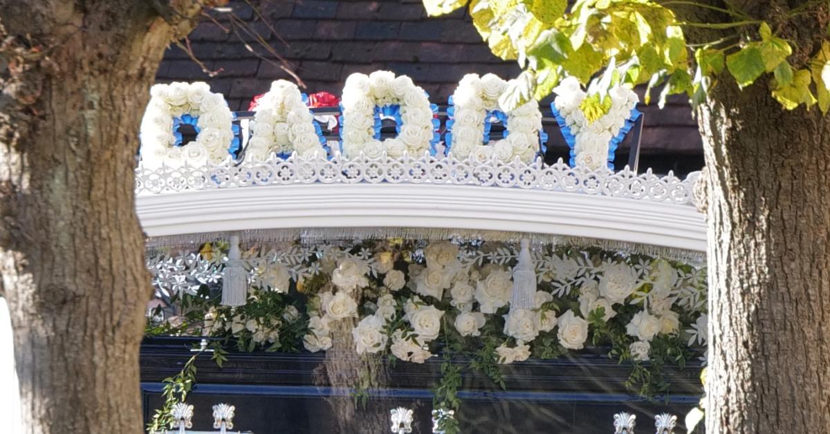 A floral arrangement spelling "Daddy" was spotted at Liam Payne's funeral. 