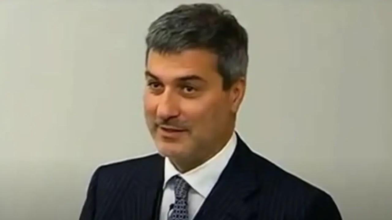 Paolo Macchiarini wearing a suit