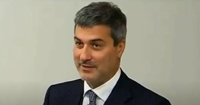 Paolo Macchiarini wearing a suit