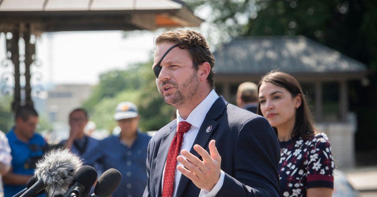 Dan Crenshaw at a press conference with AOC in a press conference. 