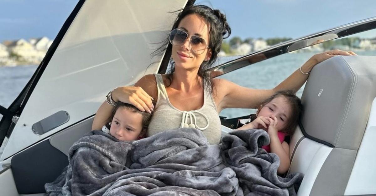 Rachel Fuda and her two daughters on a boat.