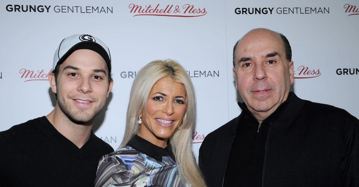 (l-r): Skylar Astin, Meryl Lipstein, and Barry Lipstein smiling on the red carpet. 