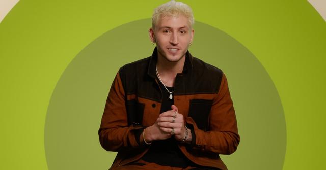 Myles from The Circle Season 6 in front of a green wall