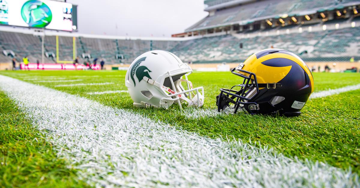 A general view of the Michigan Wolverines and Michigan State Spartans helmets before a college football game between the Michigan Wolverines and the Michigan State Spartans at Spartan Stadium on October 21, 2023 in East Lansing, Michigan