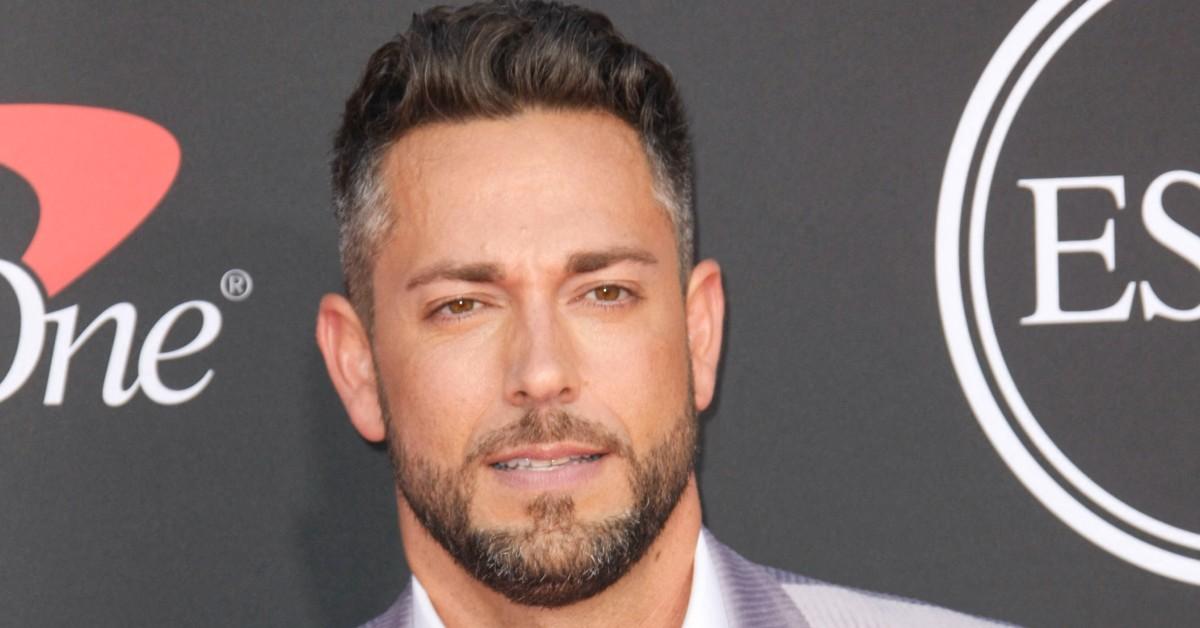 Zachary Levi posing for a photo before a screening