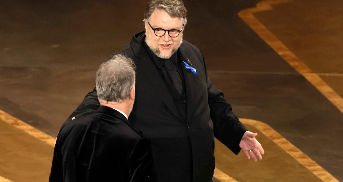 Why Are Celebrities Wearing Blue Ribbons at the Oscars?