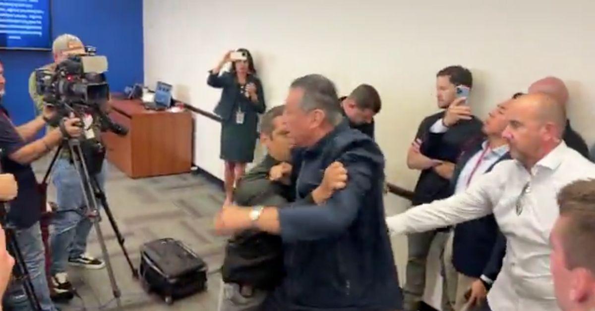 Alex Padilla being removed from the DHS press conference. 