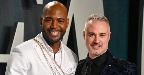 Karamo Brown and Ian Jordan pose for a photo.