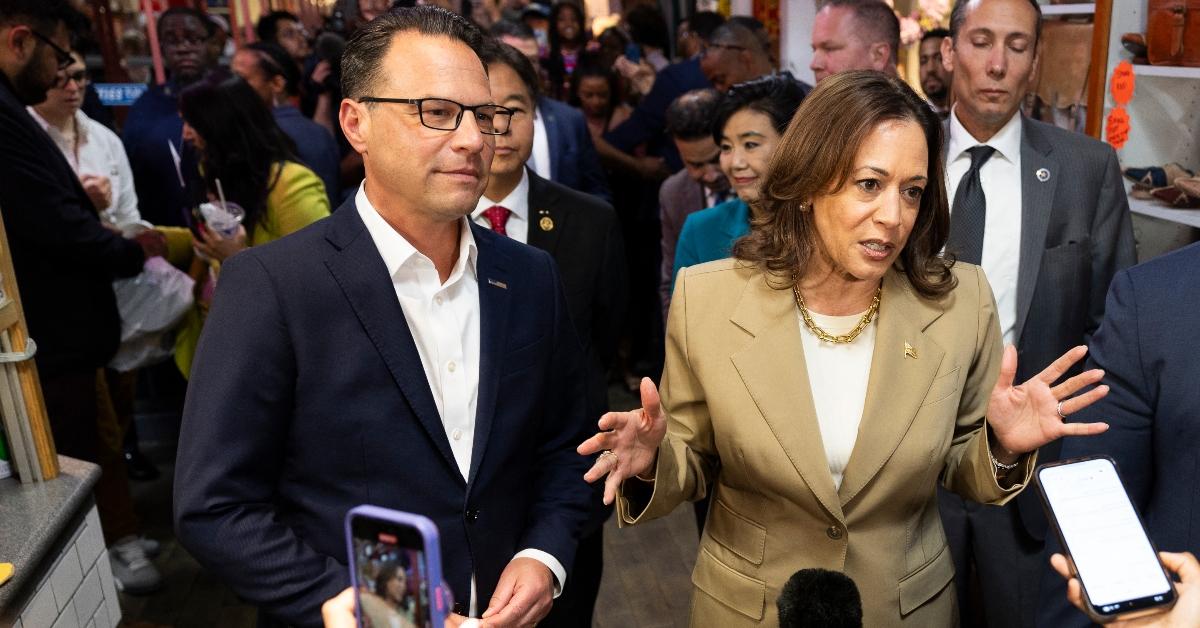 Vice President Kamala Harris and Pennsylvania Governor Josh Shapiro (L) speak to the press