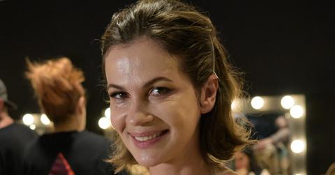 Julia Lemigova backstage getting ready for fashion show