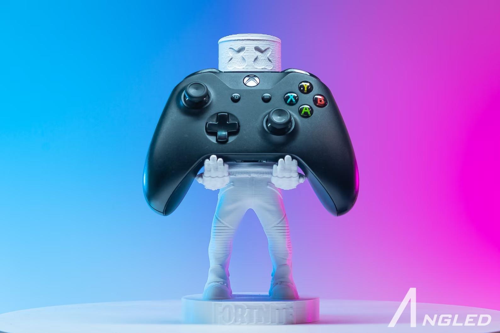 a controller stand shaped like marshmallow