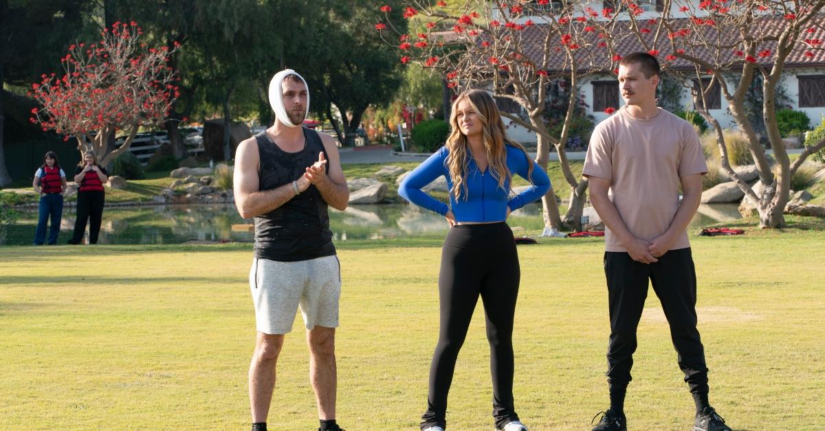 Adam, Mackenzie, and Hud stand outside during the final challenge on Claim to Fame