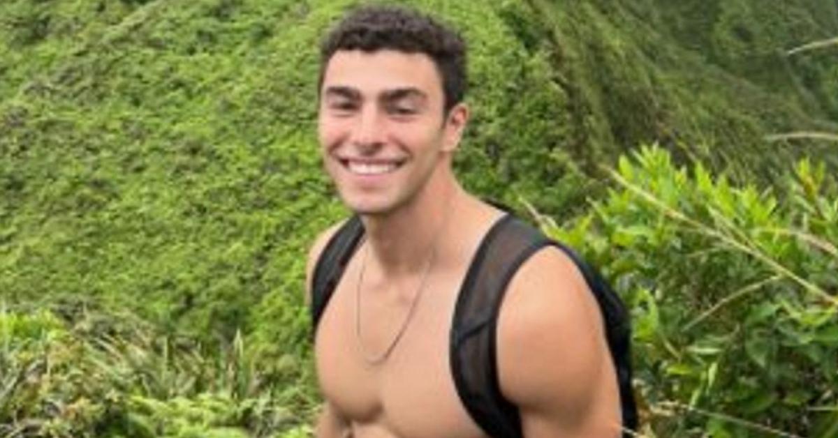 Luigi Mangione shirtless while hiking.