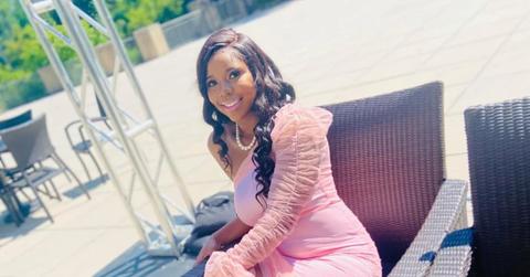 Carlee Russell smiling on a patio