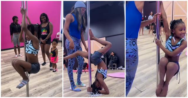 A girl pole dancing at a studio