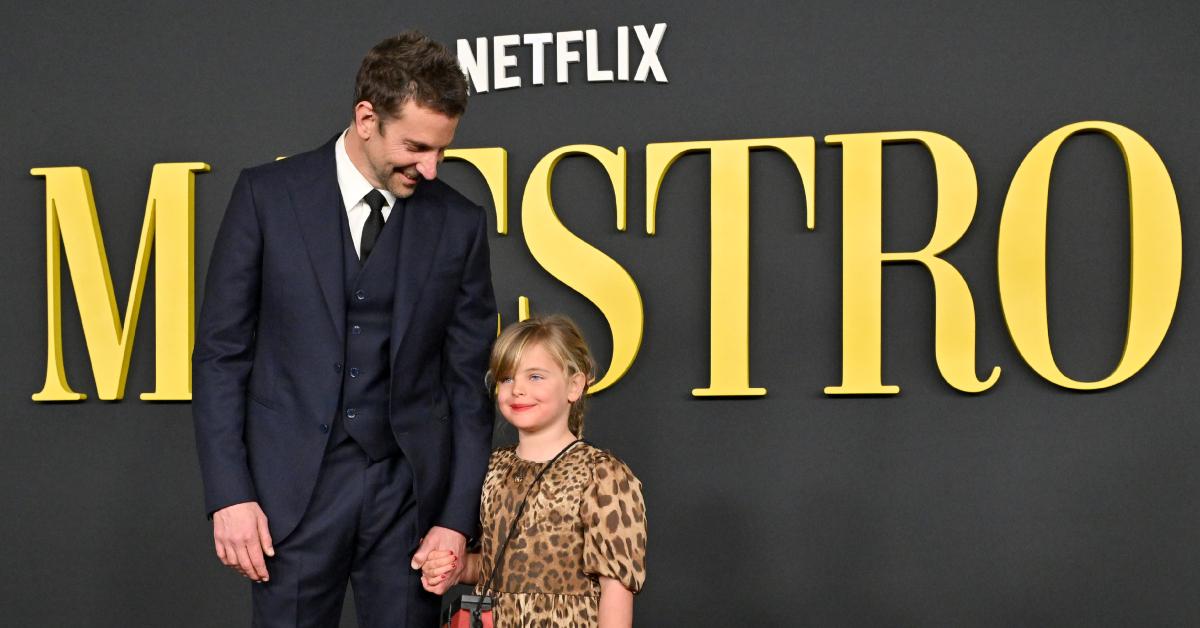Bradley Cooper looks at his daughter, Lea De Seine Shayk Cooper, during the Los Angeles premiere of 'Maestro' on Dec. 12, 2023.