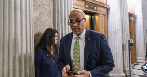 Cory Booker walking through the Capitol.