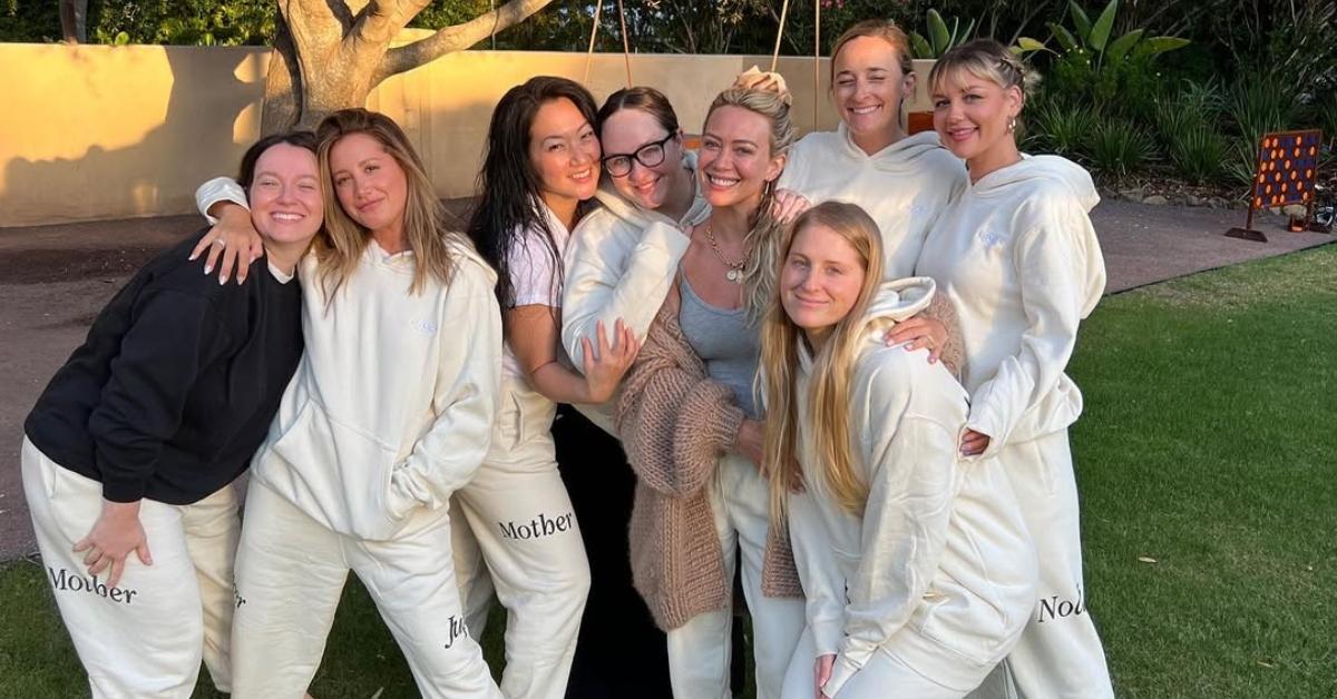 Ashley Tisdale, Hilary Duff, Meghan Trainor, and other mom friends in a group.