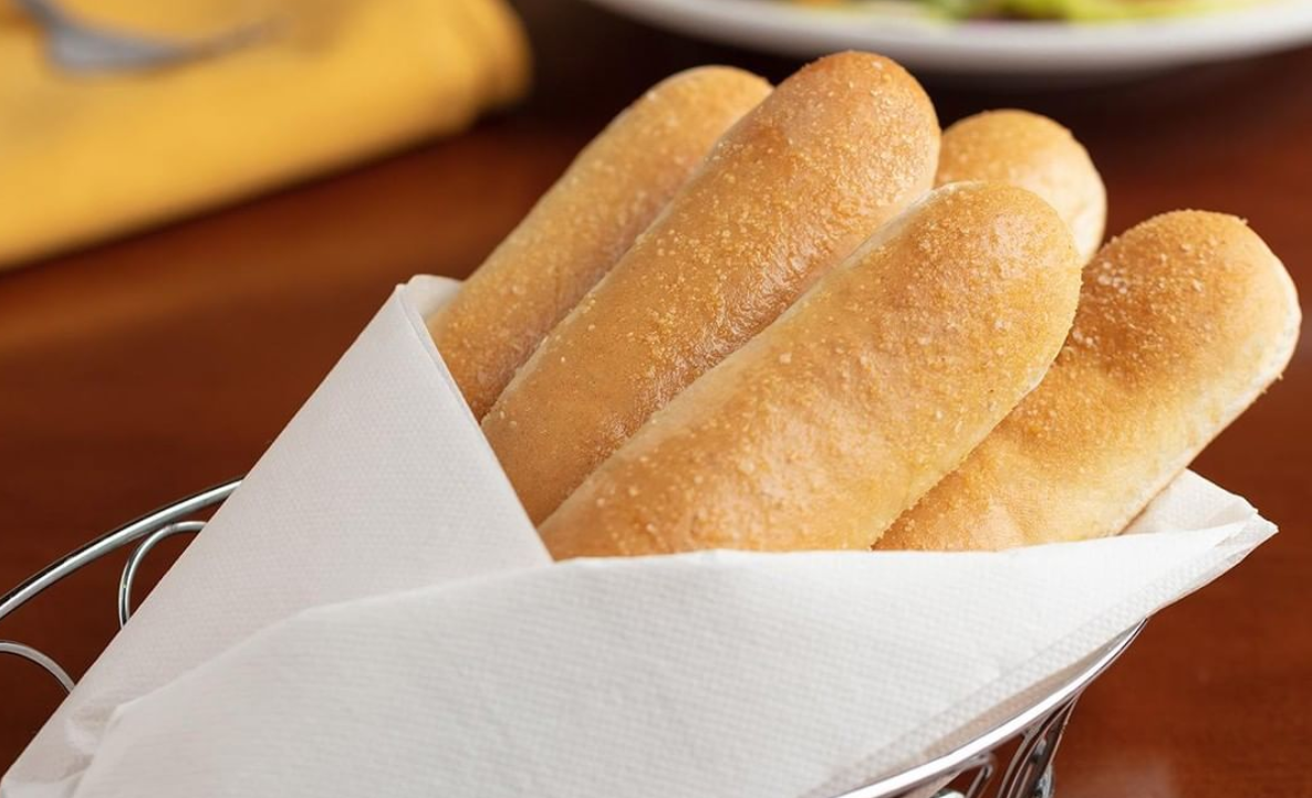 Olive Garden has unlimited breadsticks -- also lots of labor issues,  illness outbreaks, and an icky sexual harassment policy