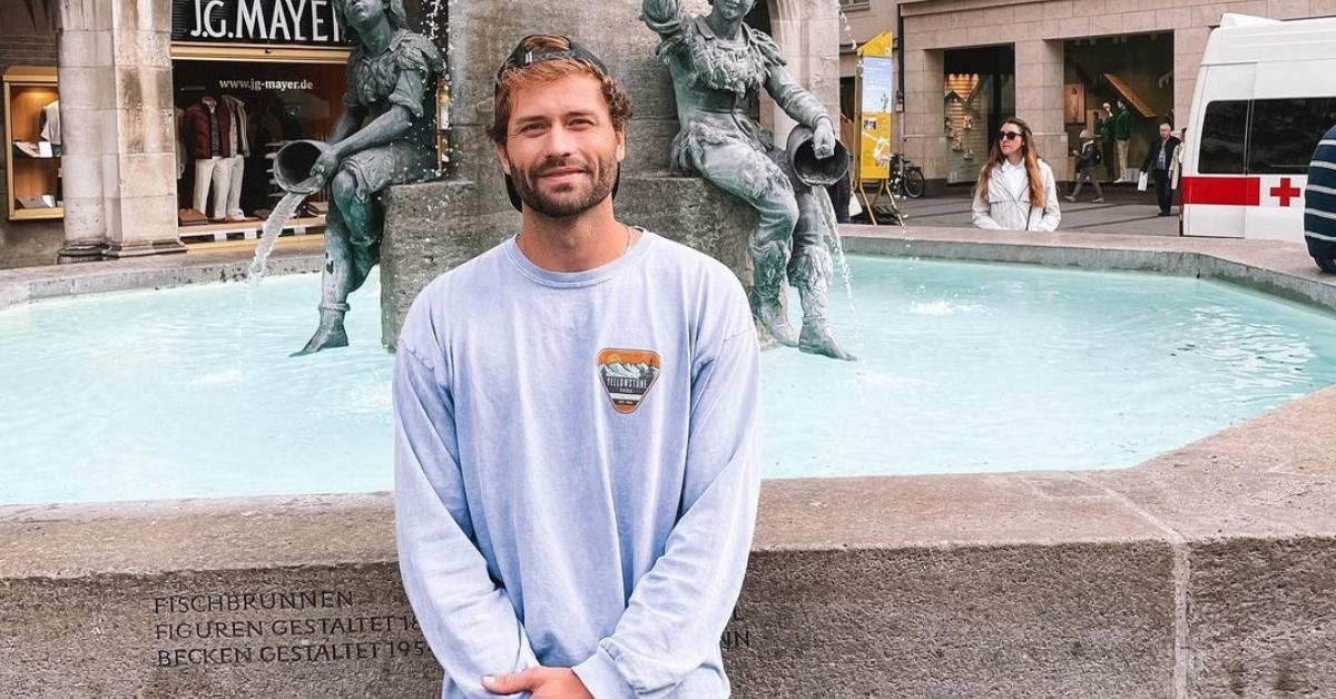 Dakota Mortensen in front of a fountain