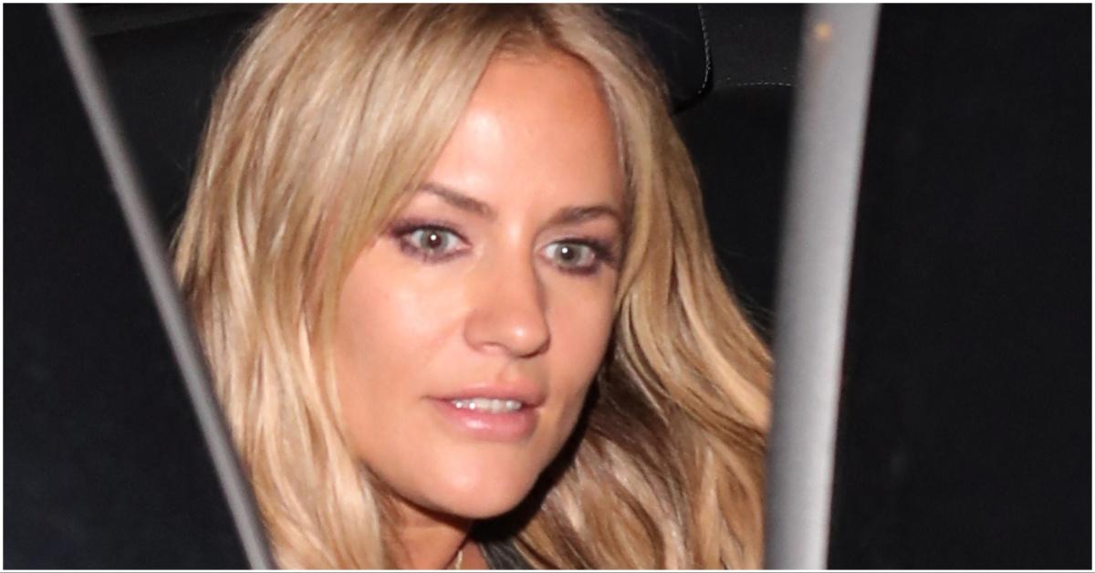 Caroline Flack getting out of a car to go to a party