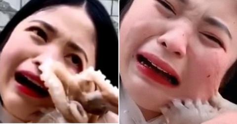 woman eating octopus