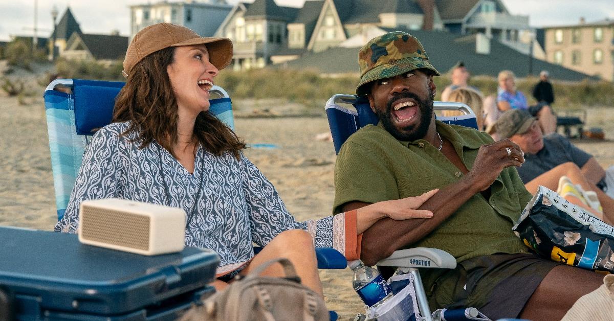 Kate and Danny enjoying one another at the beach in Netflix's The Four Seasons