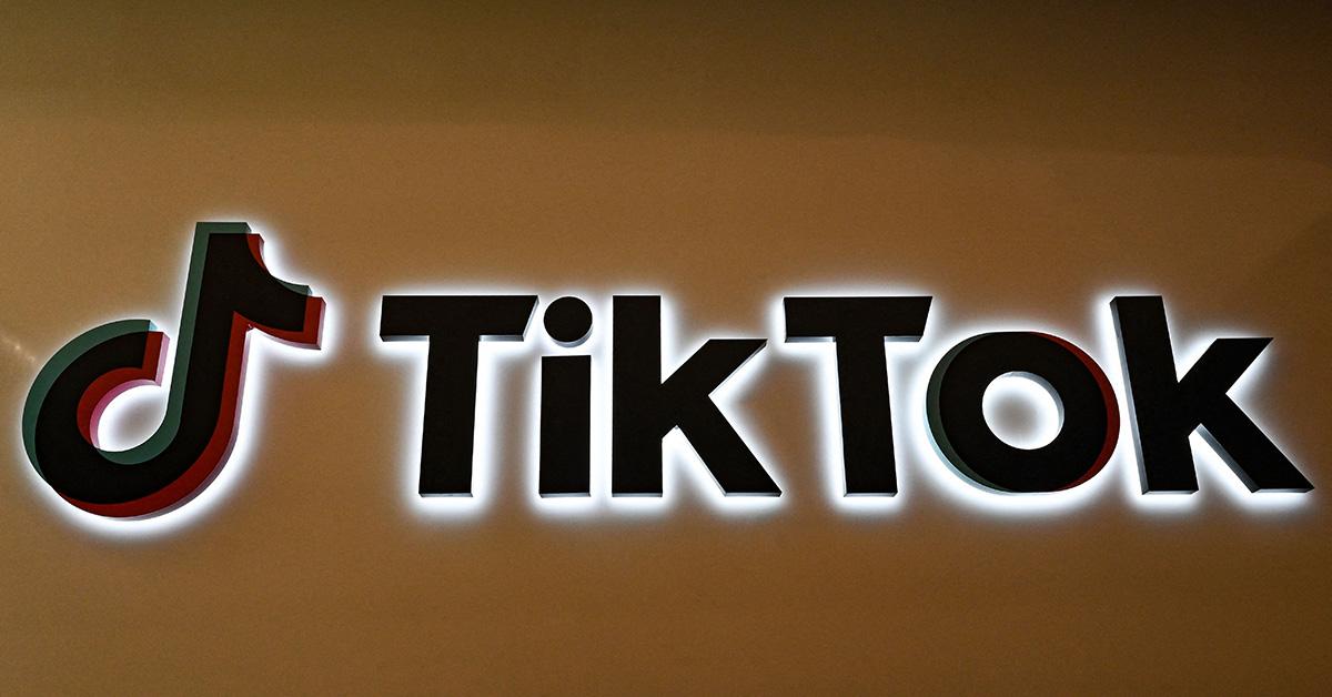 A TikTok logo on a wall