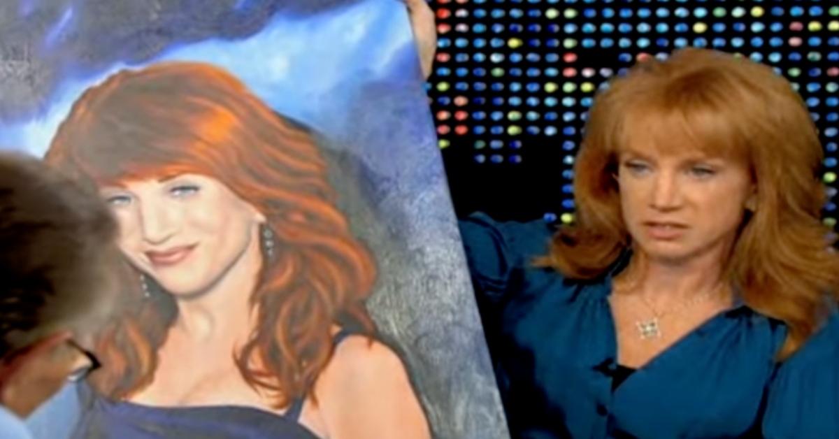 Kathy Griffin holds a painting of herself done by Erik Menendez