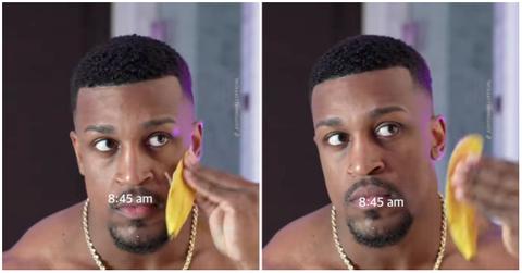 Ashton Hall rubbing a banana peel on his face