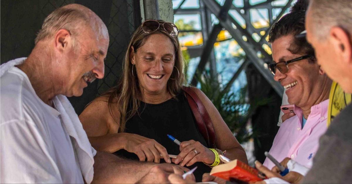 Phil McGraw signs autographs for fans.
