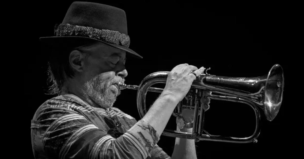 Chuck Mangione performing on stage.