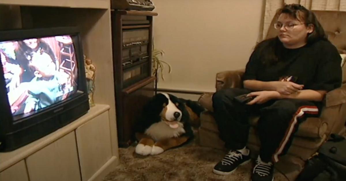 Theresa Czapiewski watching old movies of her daughter in 1999