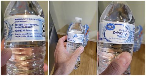 Man shows front and back of water bottle for Walmart replacement hack.