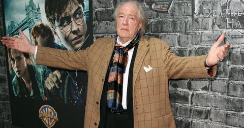 Michael Gambon attends the grand opening of Harry Potter: The Exhibition at the Discovery Times Square Exposition Center on April 4, 2011 in New York City