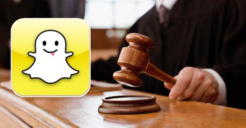 Snapchat logo / judge with gavel