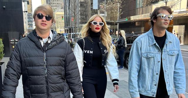 Alexia Nepola walking with her adult son, Frankie and Peter