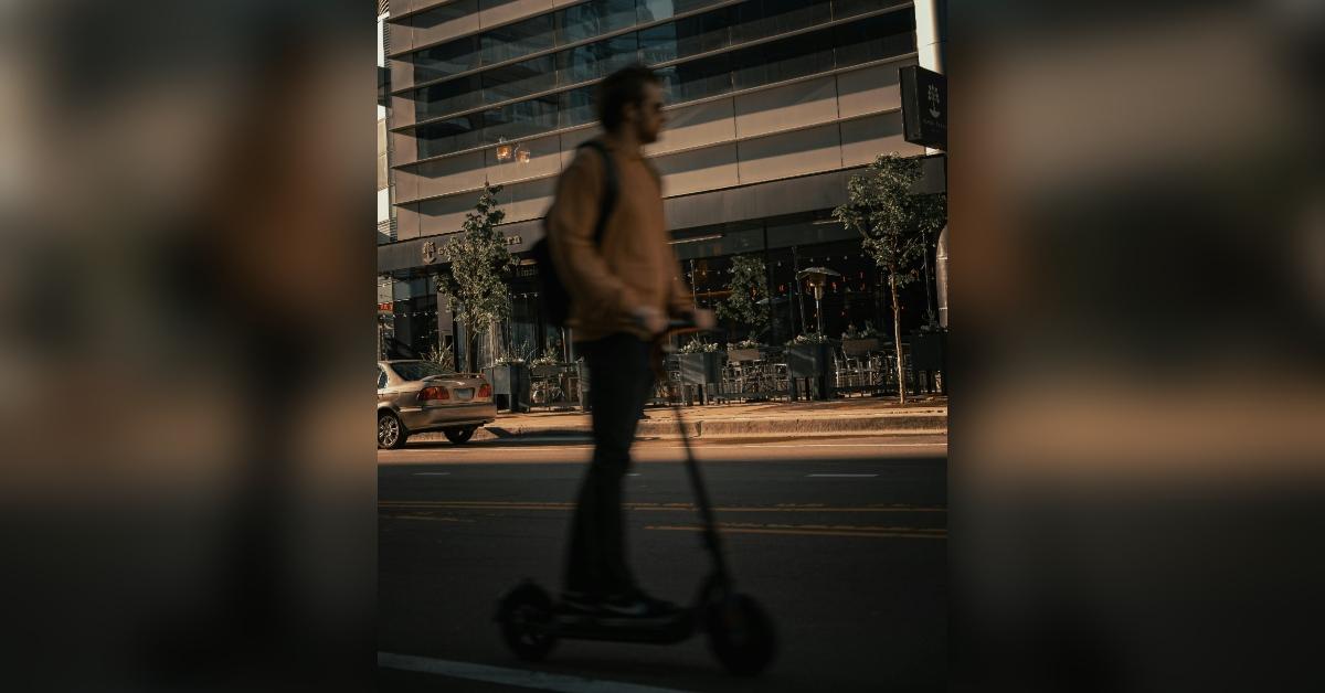 man on scooter
