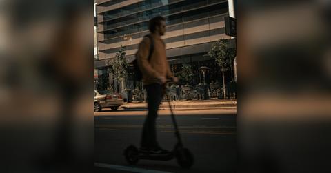 man on scooter
