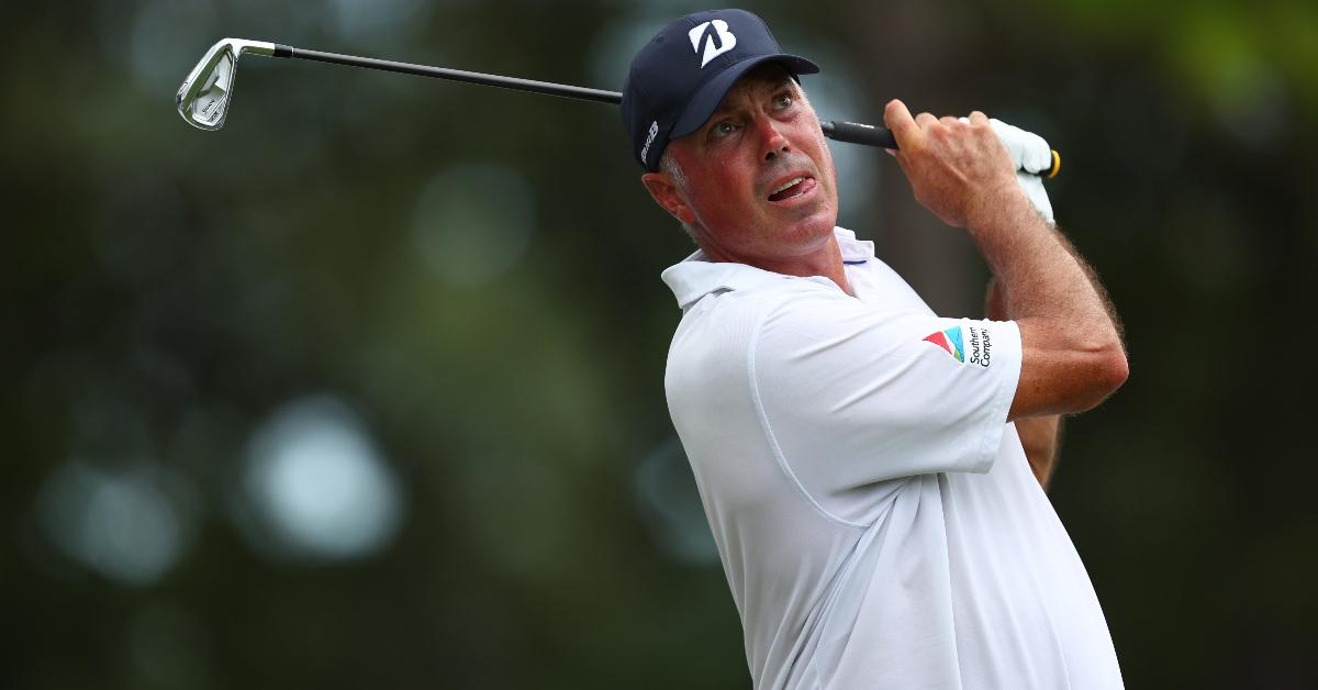 Matt Kuchar of the United States plays his shot from the 16th tee during the first round of the Wyndham Championship at Sedgefield Country Club