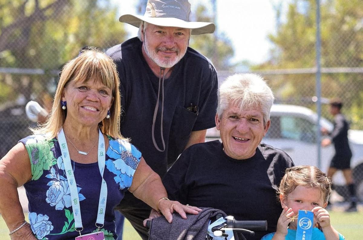 Amy Roloff with Chris, Matt, and her granddaughter.