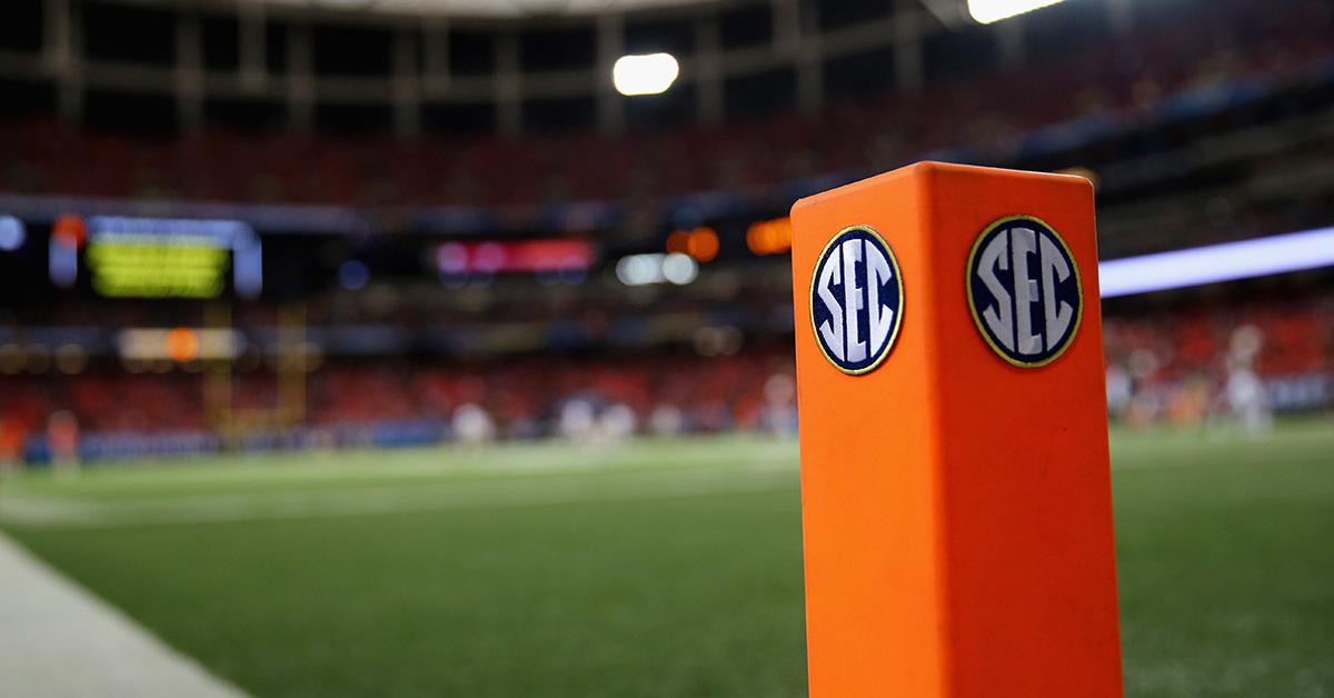 The SEC logo on a football pylon. 