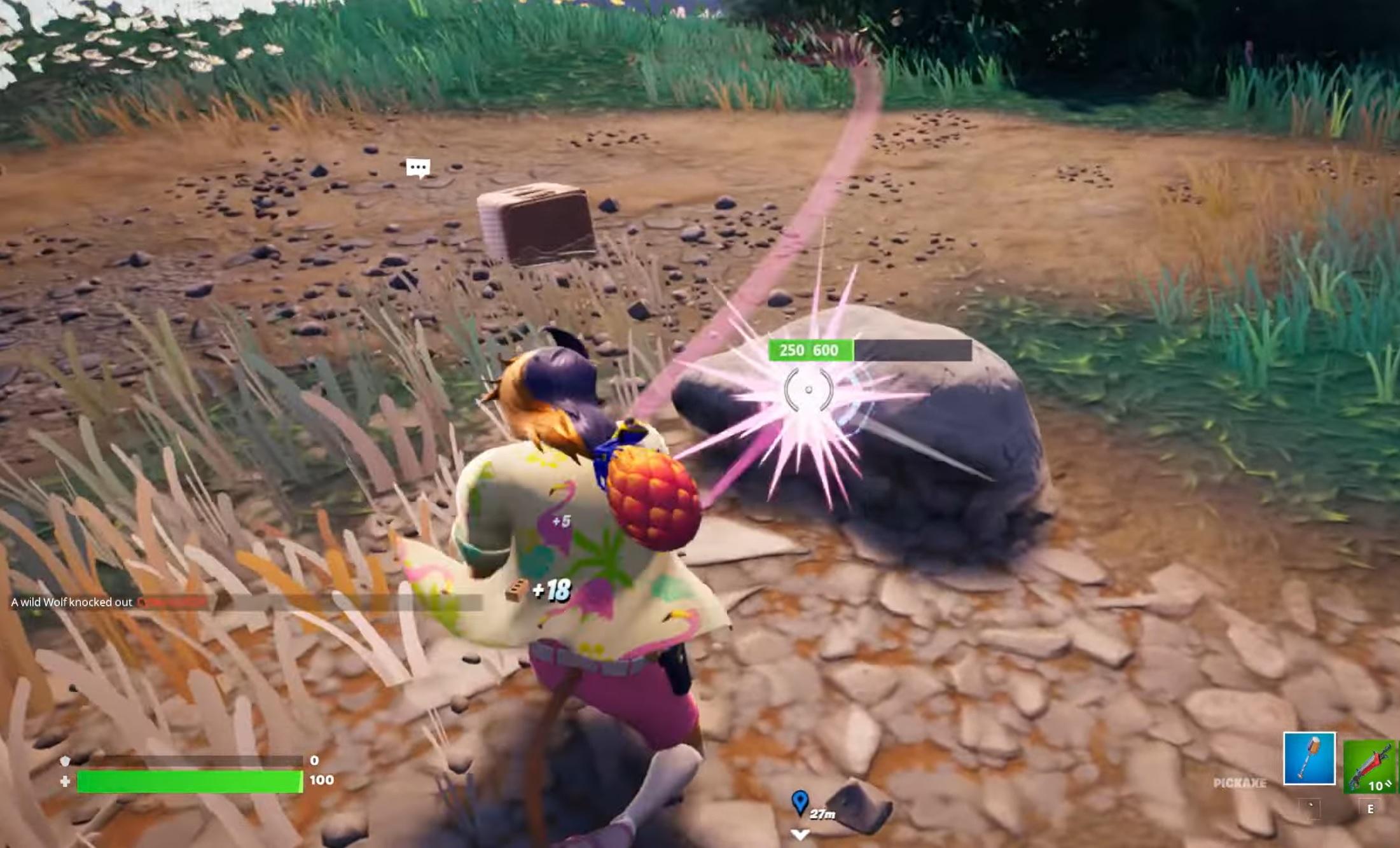 A Fortnite player destroying a stone for the Summer Escape quest.