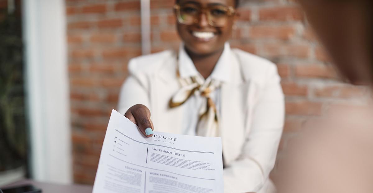 Job applicant hands in resume