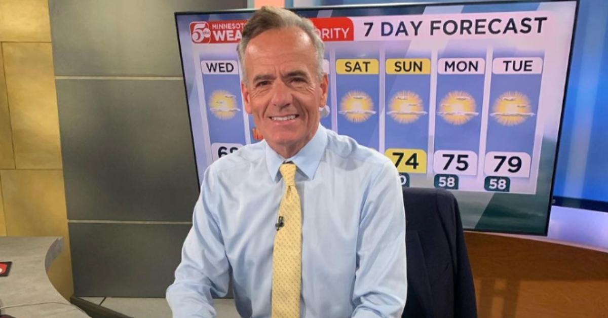 Ken Barlow smiles at his desk at KSTP-TV.