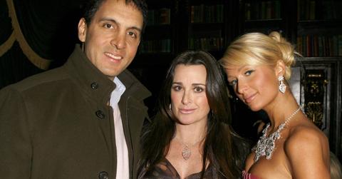 Mauricio Umansky, Kyle Richards, and Paris Hilton pose for photo in 2012