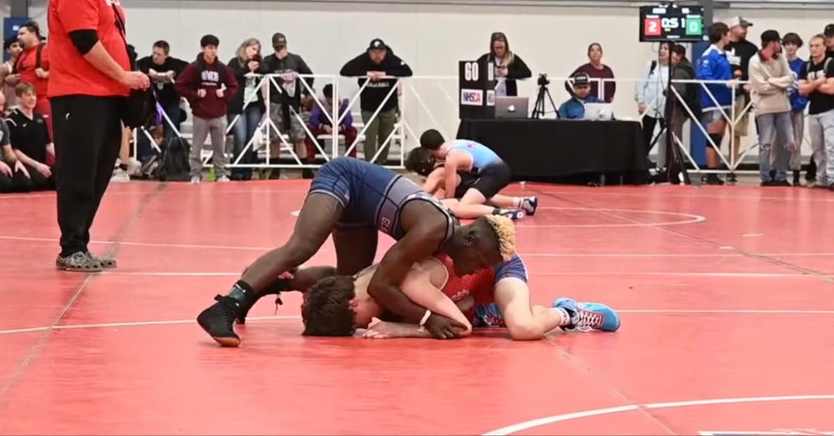 Dunia Sibomana Rodriguez wins a wrestling match.