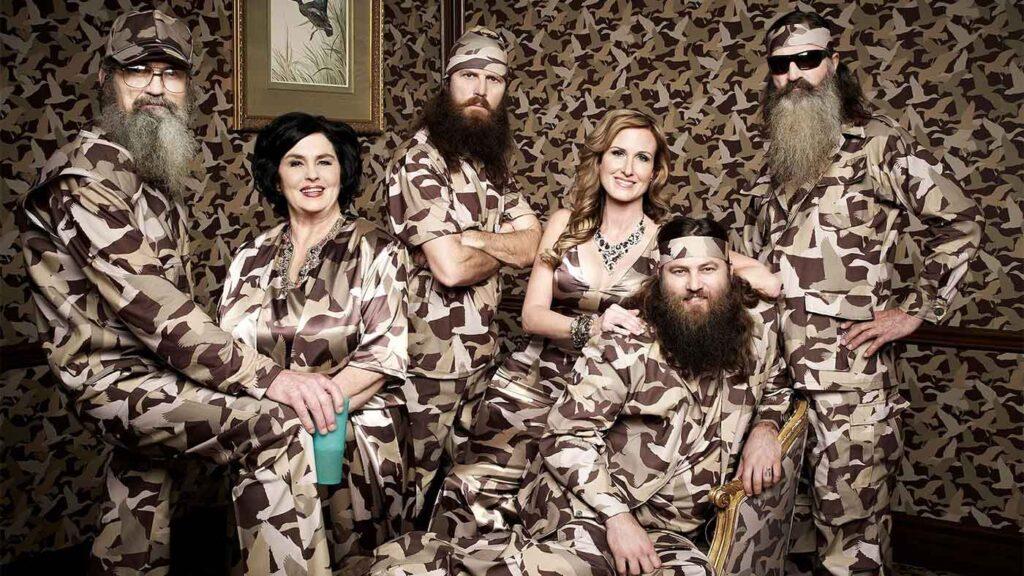 'Duck Dynasty' cast poses in camo outfits against a camo backdrop